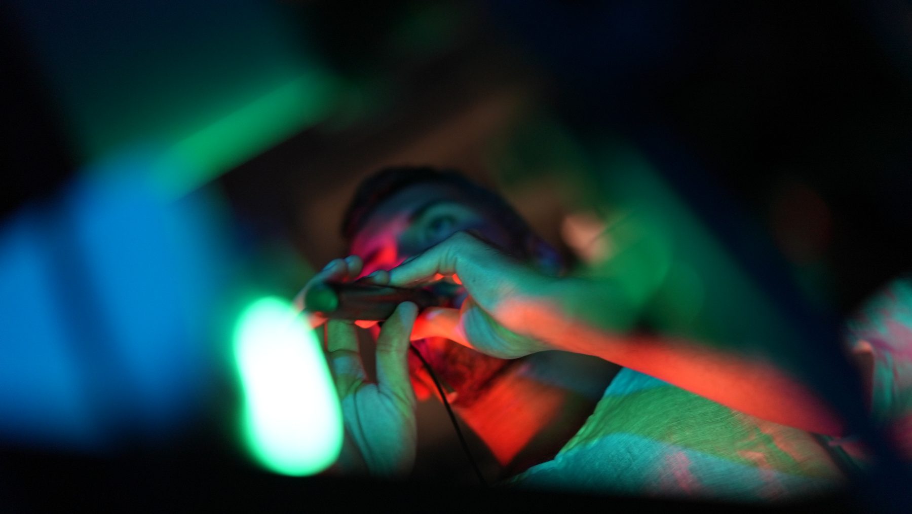 Close-up of hands playing the Balaban